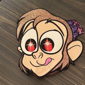 New Disney by Danielle Nicole Abu from Aladdin crossbody brown glitter crossbody